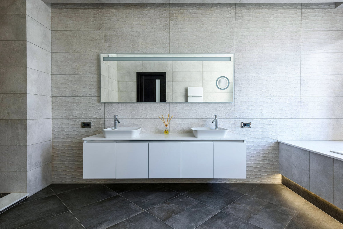 Modern white floating double vanity with vessel sinks and large rectangular mirror in a luxury bathroom.
