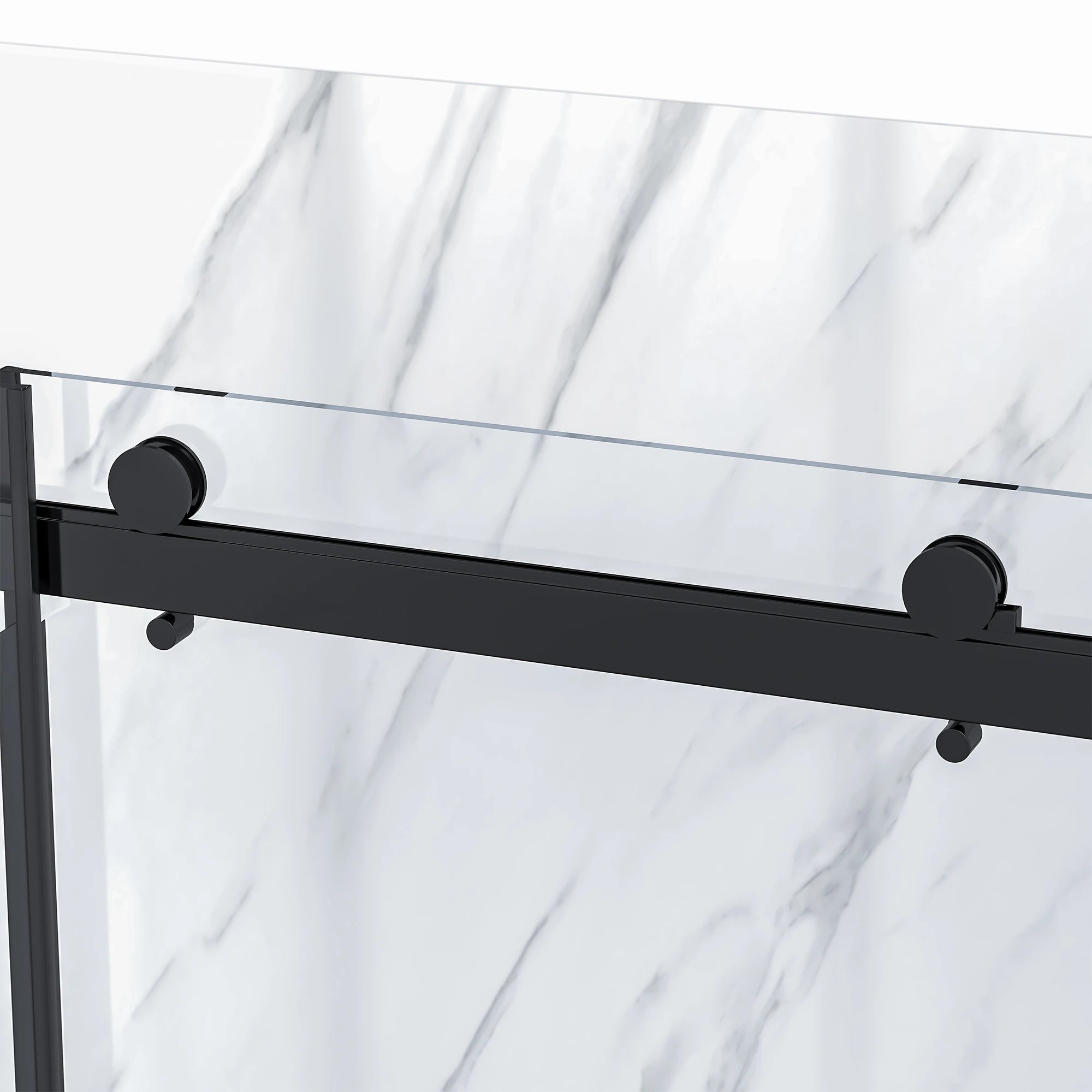 Close-up of a Dreamwerks shower kit showing the semi-frameless sliding door system. It features a matte black top rail and exposed circular rollers that smoothly guide the clear tempered glass panel over the white marble-look shower wall.