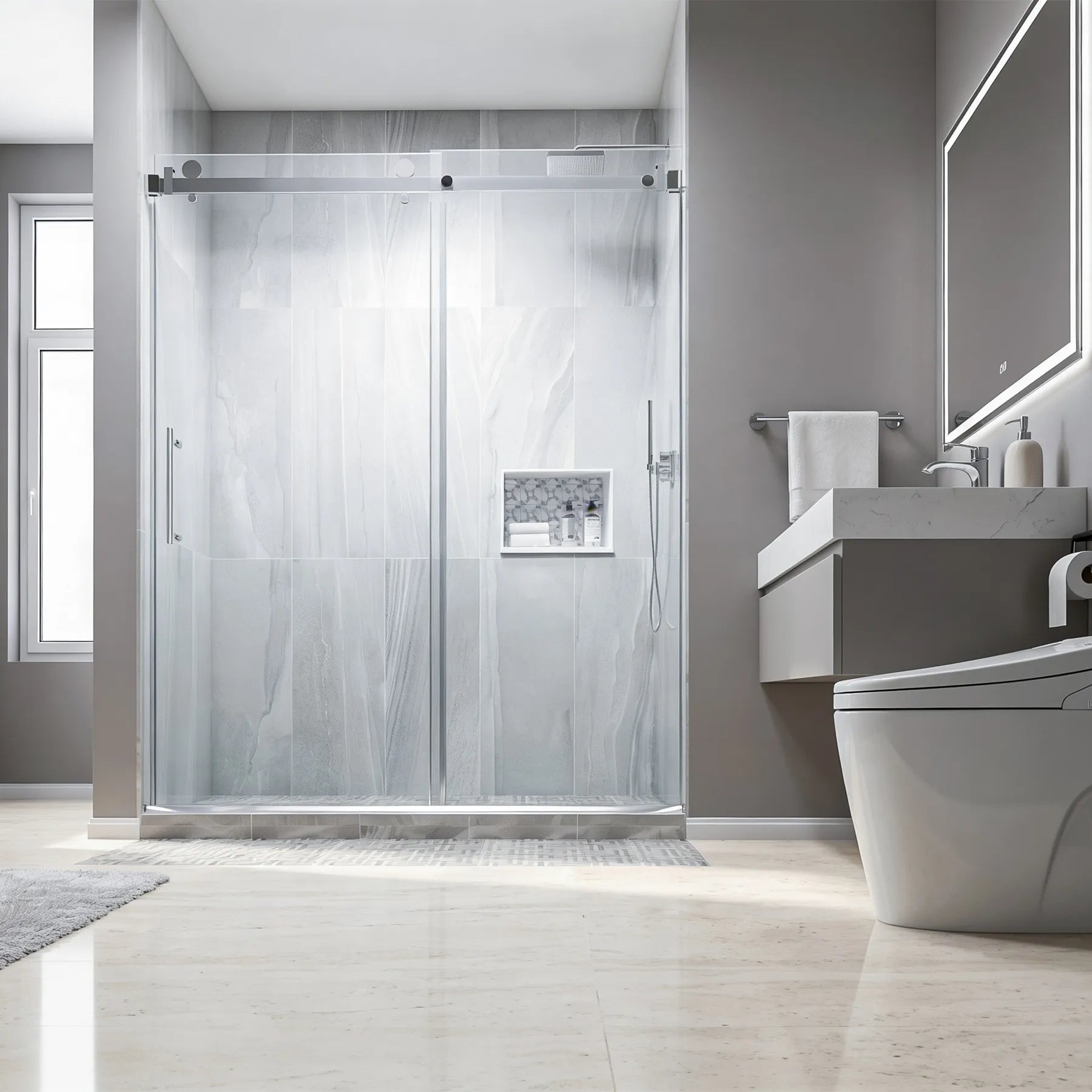 Modern bathroom with glass shower enclosure, sink, and toilet.
