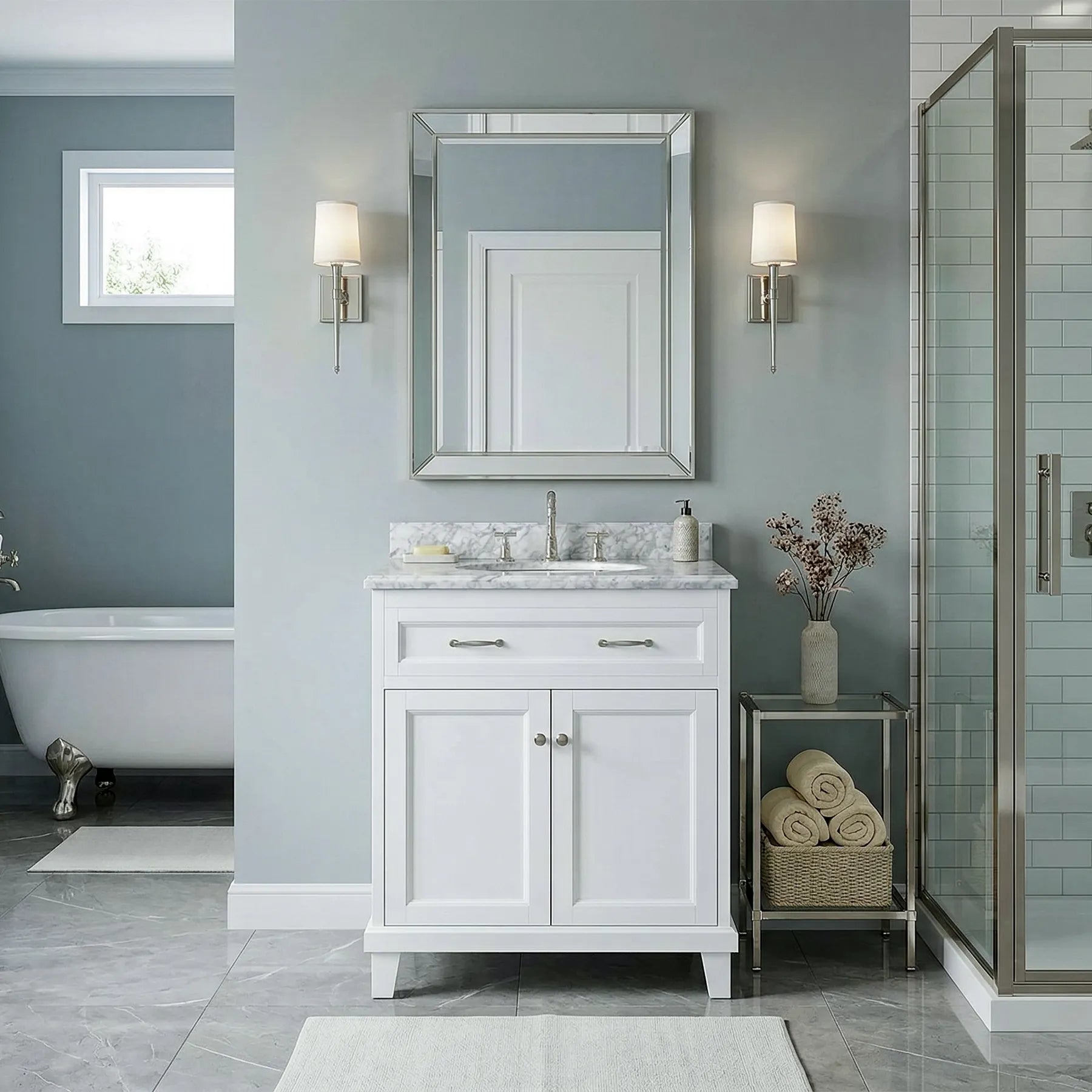 Bathroom with white vanity, mirror, and bathtub against a gray wall.