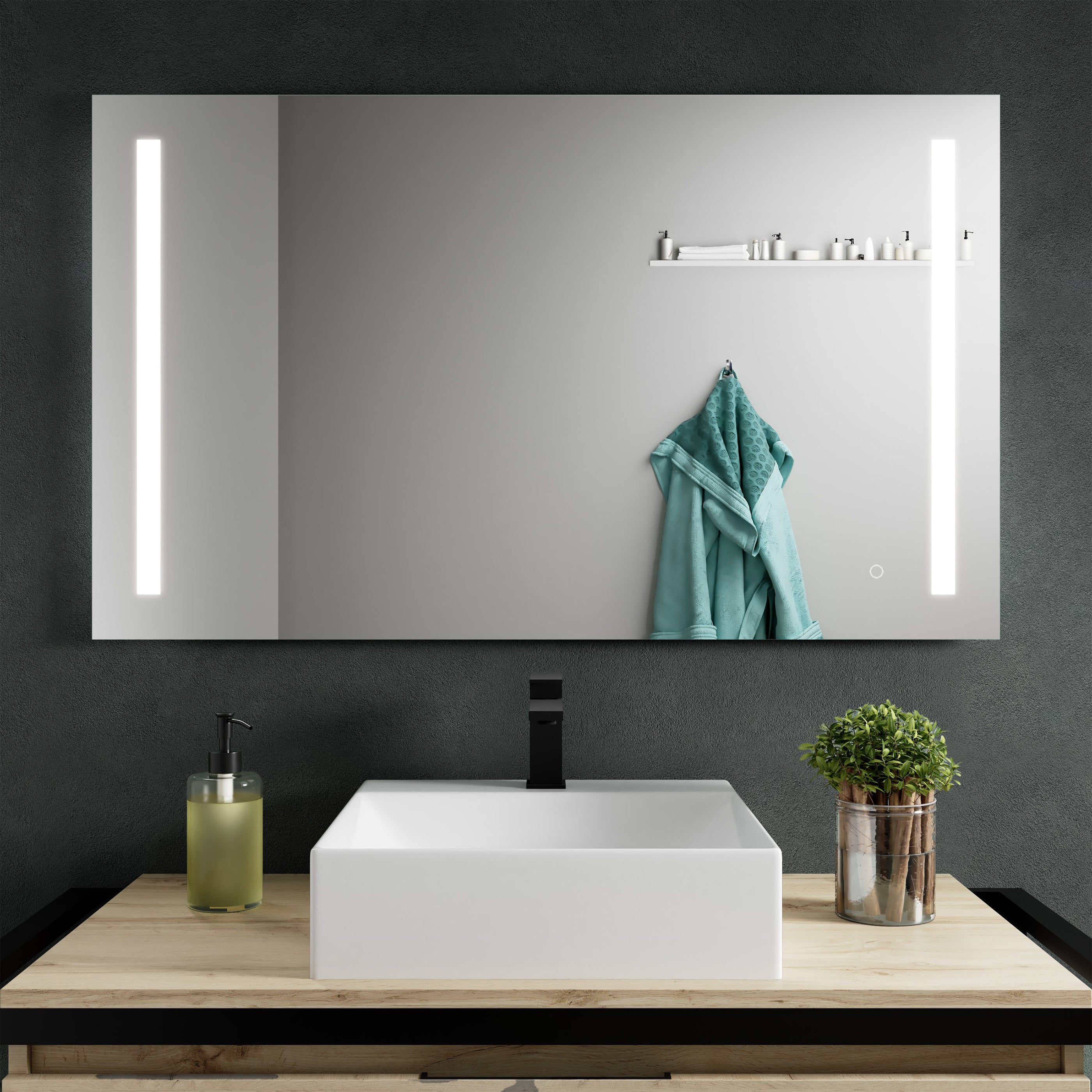 Modern bathroom interior with a minimalist rectangular basin, sleek black faucet, and a large TREVISO LED mirror with integrated vertical lighting and defogger, complemented by natural wood accents and greenery for