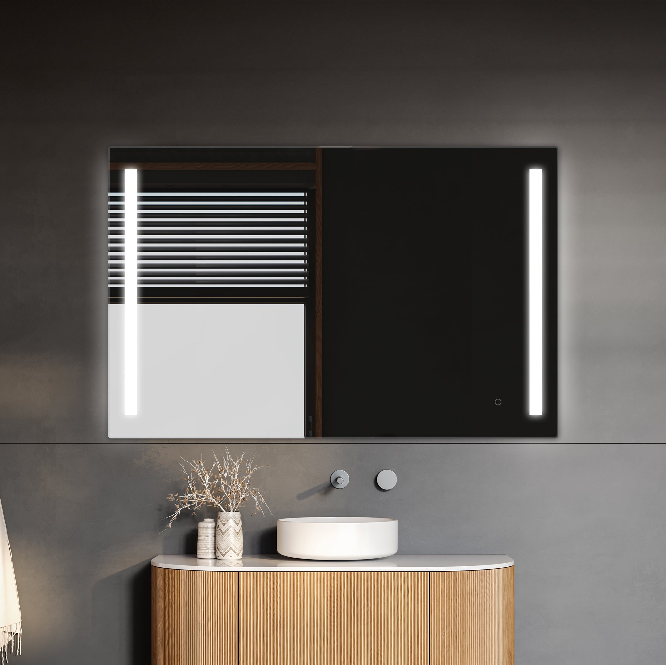 Modern minimalistic bathroom vanity with elegant curved wooden design, featuring a sleek washbasin and a stylishly lit TREVISO LED Mirror with an integrated defogger, all set against a sophisticated dark in close up image.