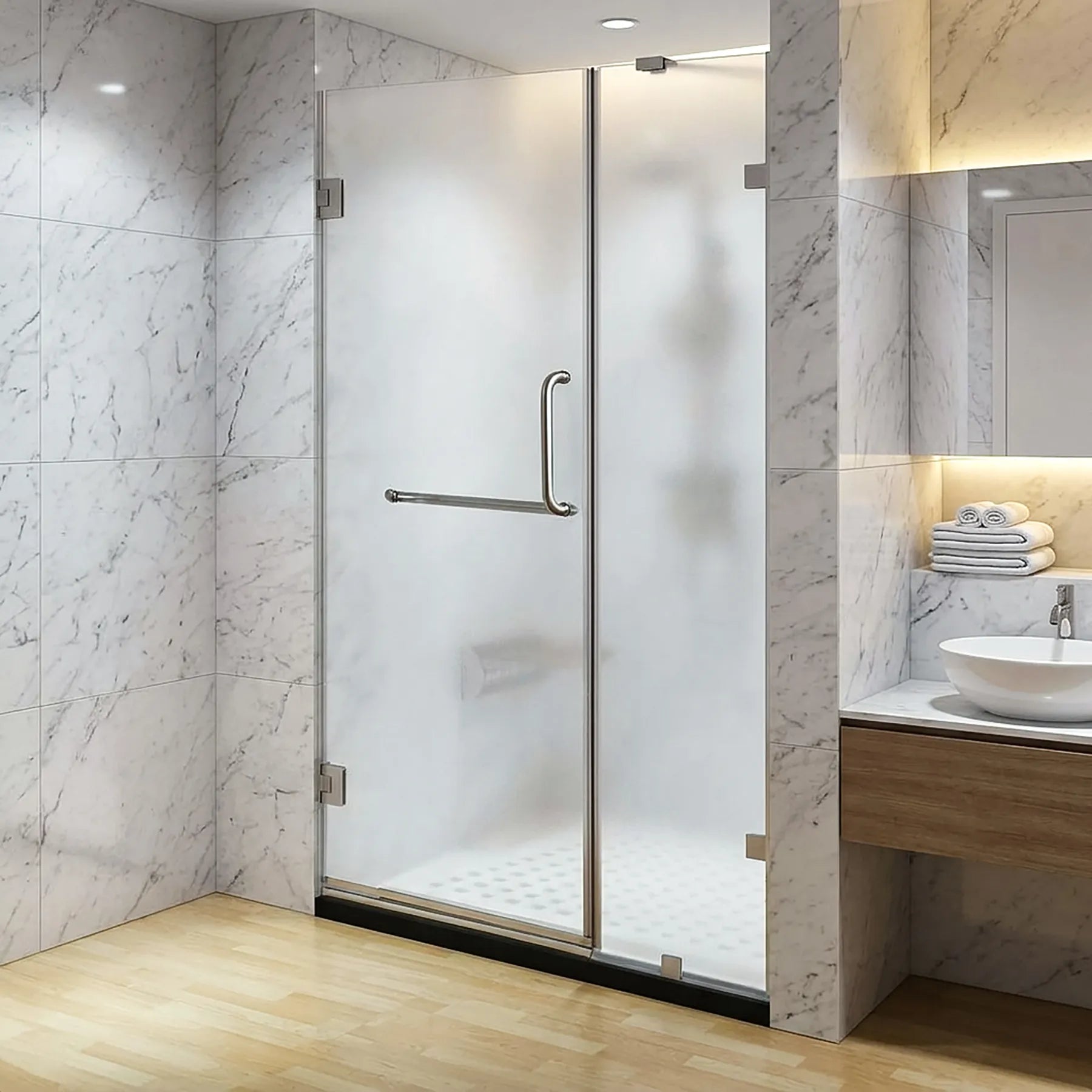 Modern bathroom with 60 in. frosted glass frameless hinged shower door in chrome with handle and towel bar.