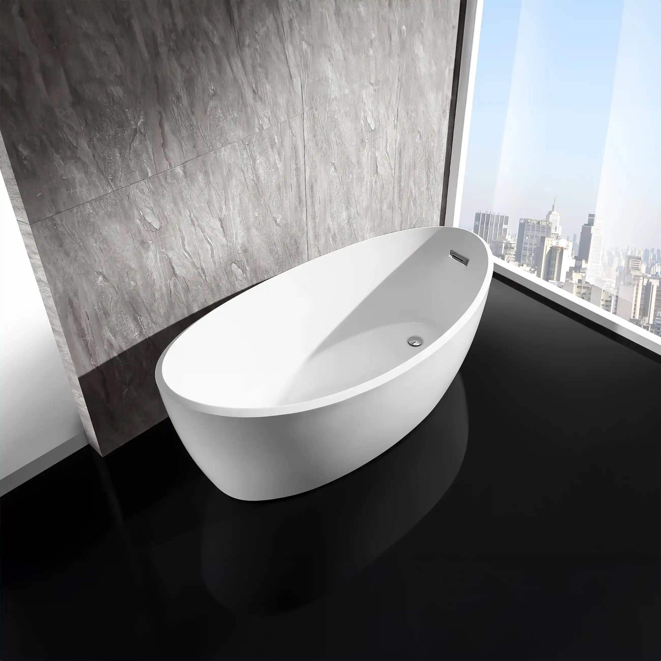 Modern bathroom featuring a large, white, oval-shaped freestanding bathtub on a glossy black floor, set against a dark grey stone wall and a floor-to-ceiling window with a view of a city skyline.