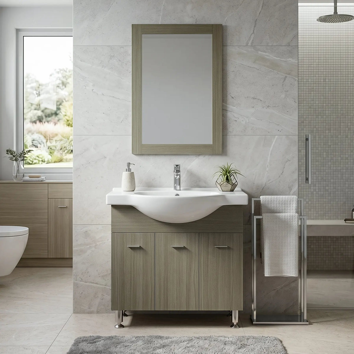 A modern bathroom vanity set by dreamwerks, featuring a light gray wood cabinet, a white ceramic sink, a matching rectangular mirror, and a chrome faucet, set against a large gray marble tile wall.