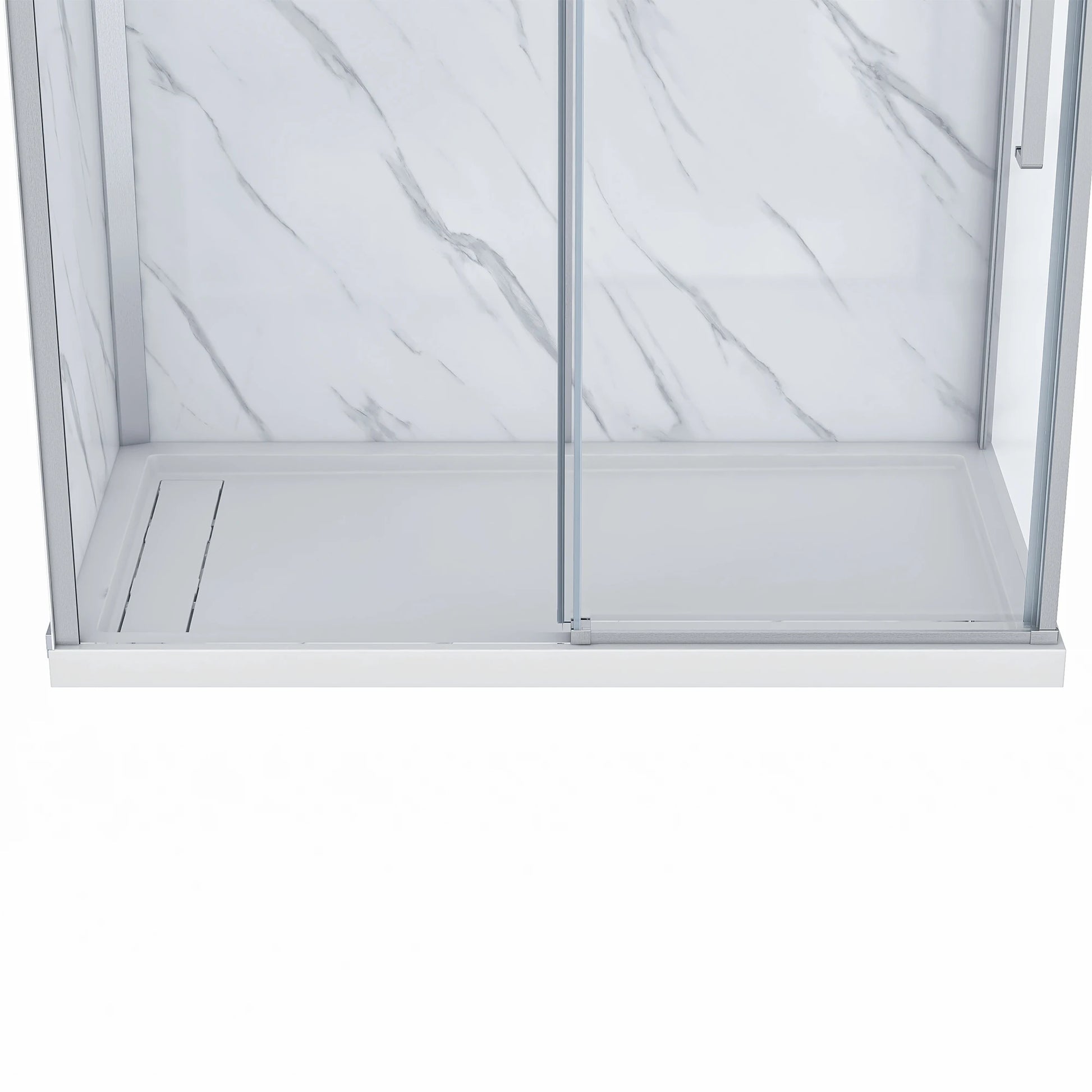 Close-up of the Dreamwerks shower base and lower door track, showing the low-profile white shower pan with the integrated linear drain cover, and the sliding door track finished in brushed nickel.