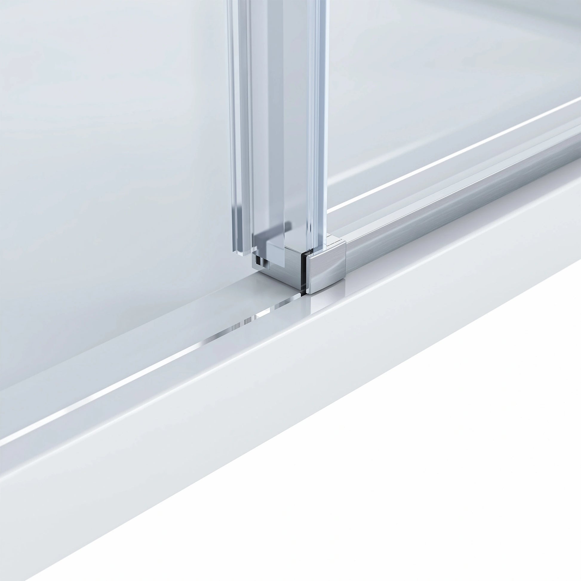 Detailed close-up of the Dreamwerks shower door's vertical side frame and bottom rail connection in a satin brushed nickel finish, where the clear glass panel meets the white shower base.