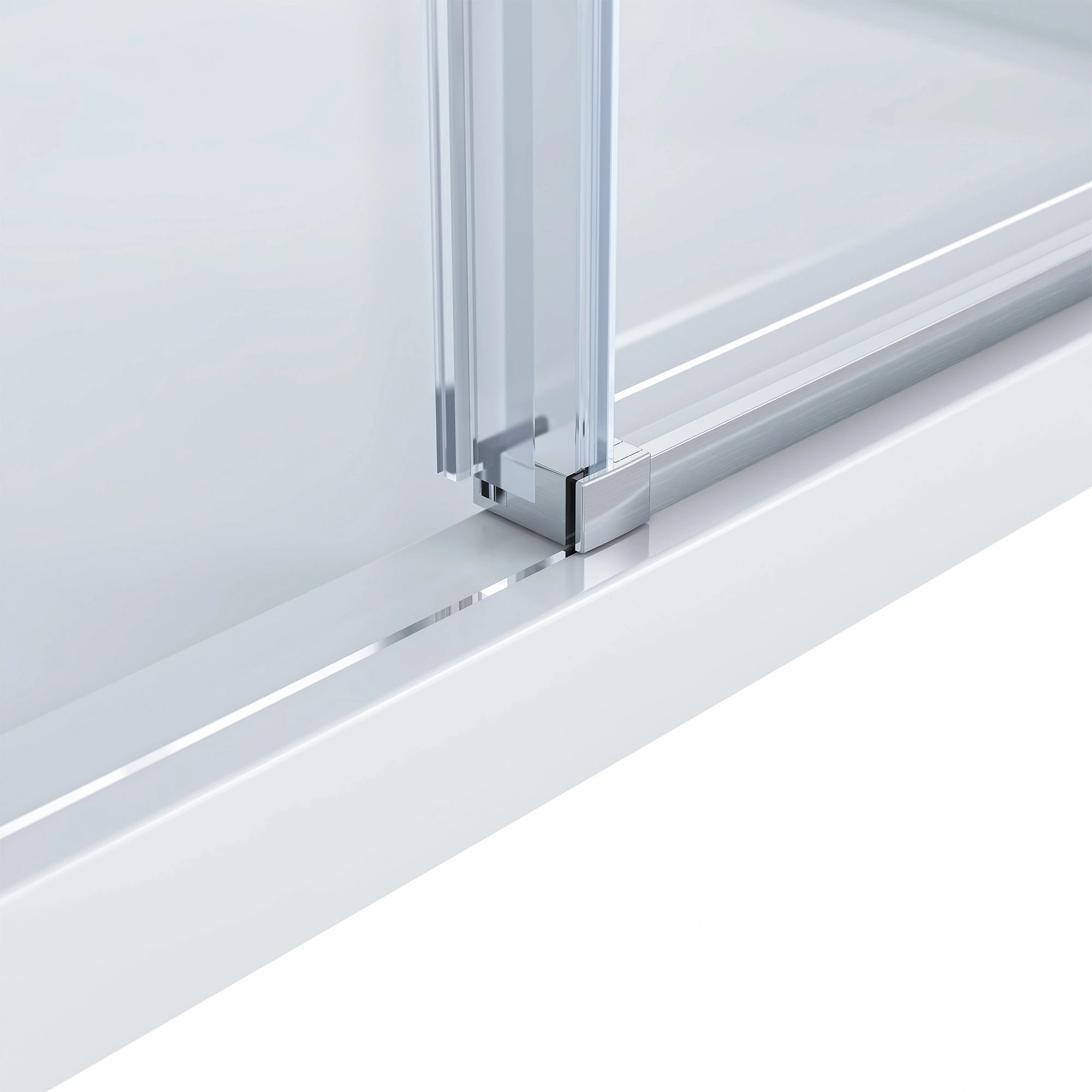 Detailed close-up of the Dreamwerks shower door's vertical side frame and bottom rail connection in a satin brushed nickel finish, where the clear glass panel meets the white shower base.