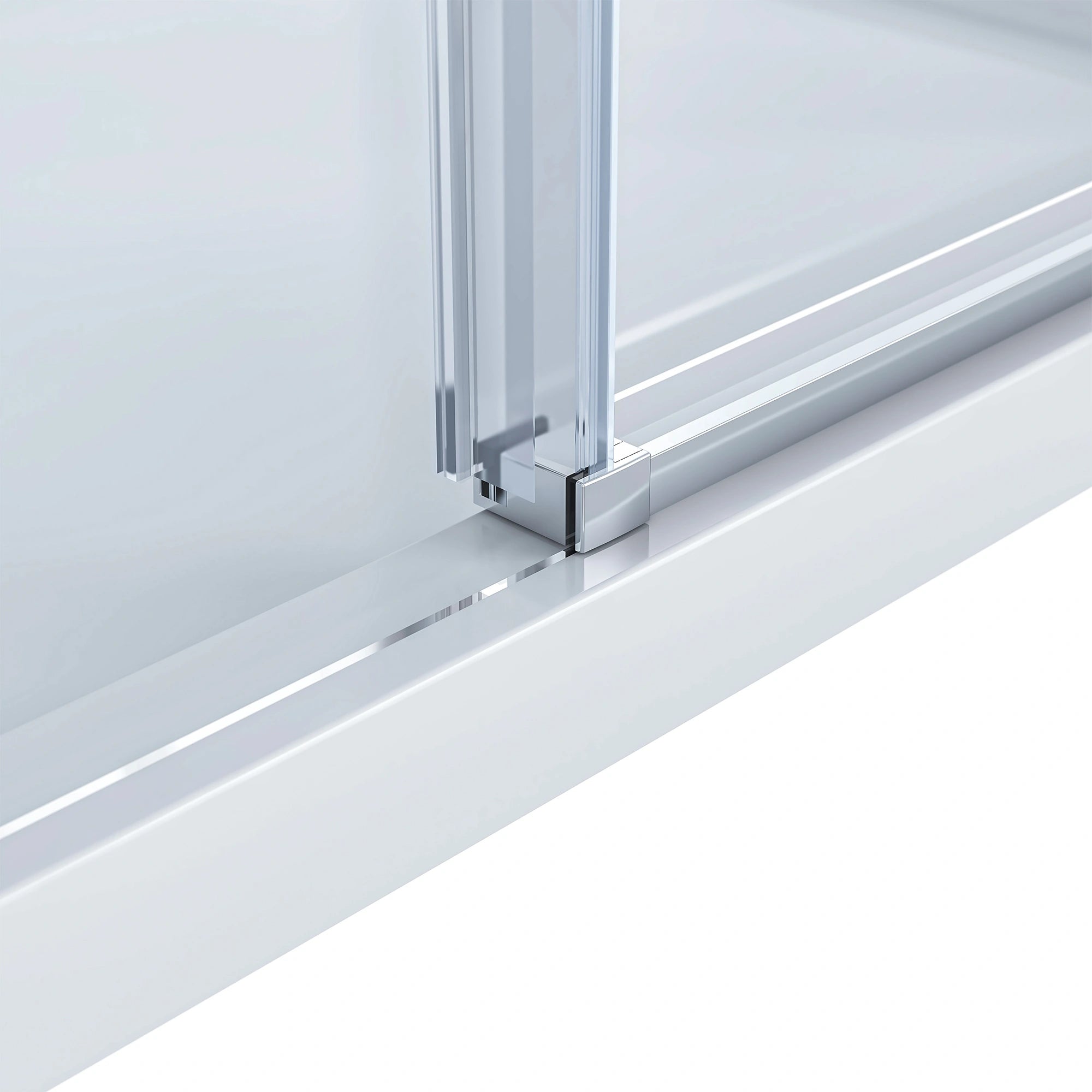 Detailed close-up of the Dreamwerks shower door's vertical side frame and bottom rail connection in a polished chrome finish, where the clear glass panel meets the white shower base.