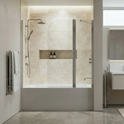 Modern bathroom with shower enclosure, towel rack, and sink.