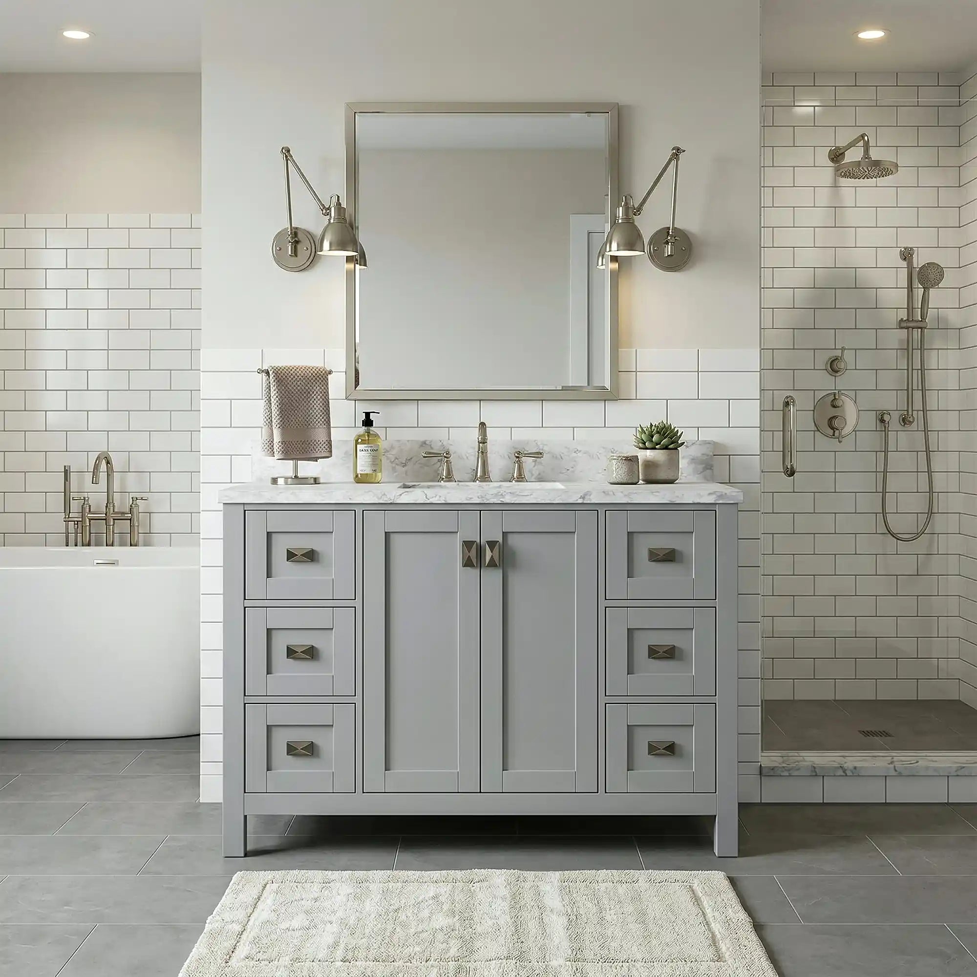 Bathroom with gray vanity, mirror, and shower area.