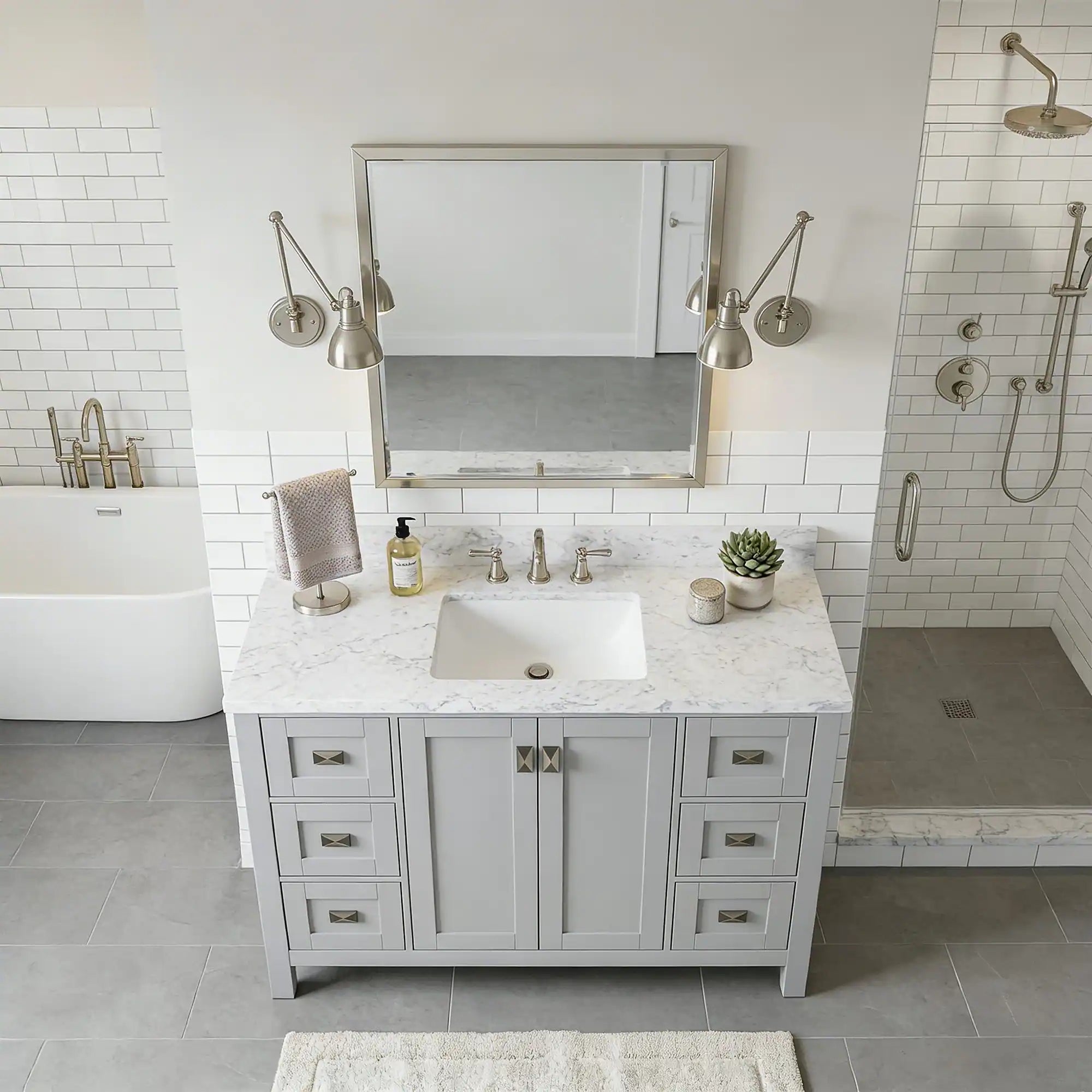 Bathroom with marble vanity, sink, and mirror in a modern setting.