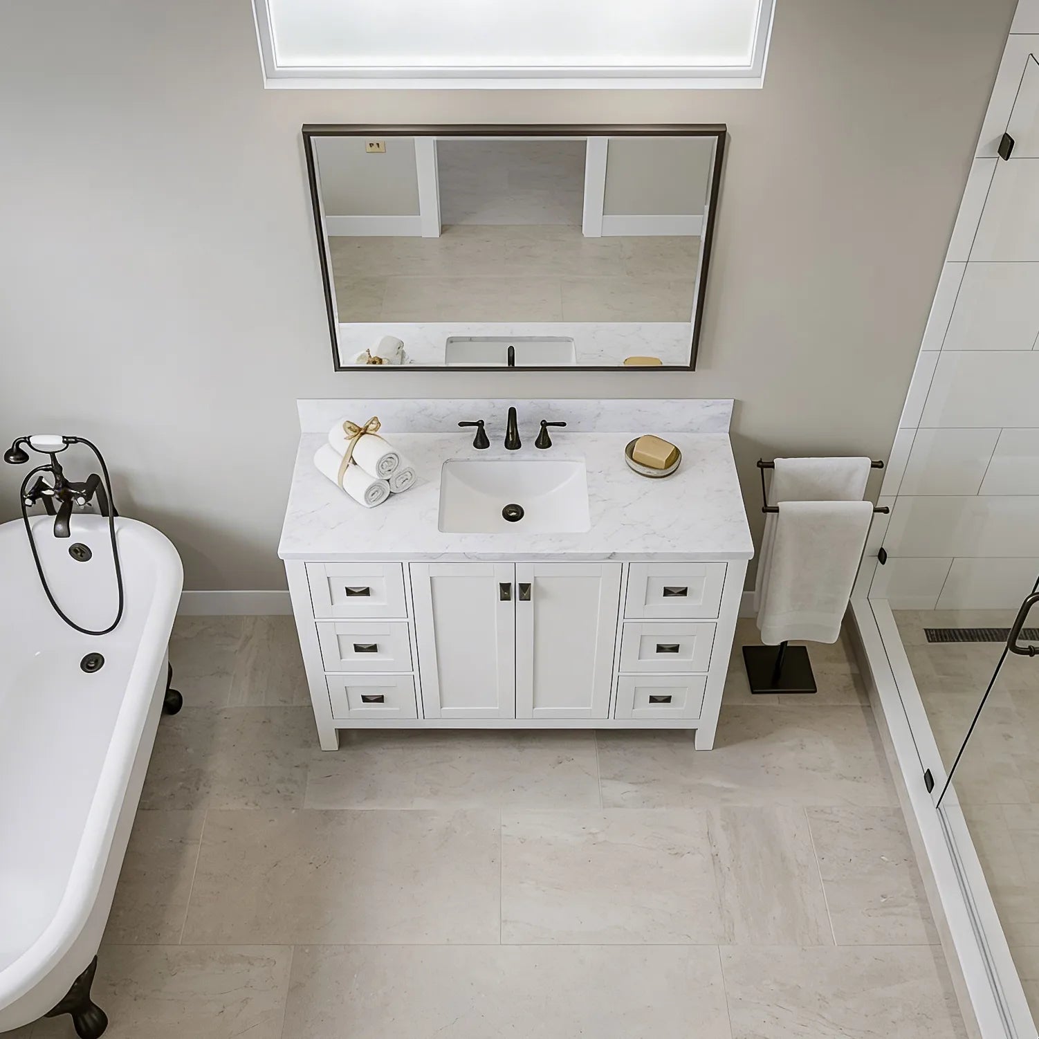 Bathroom with white Maison 48 inch vanity, sink, and bathtub.