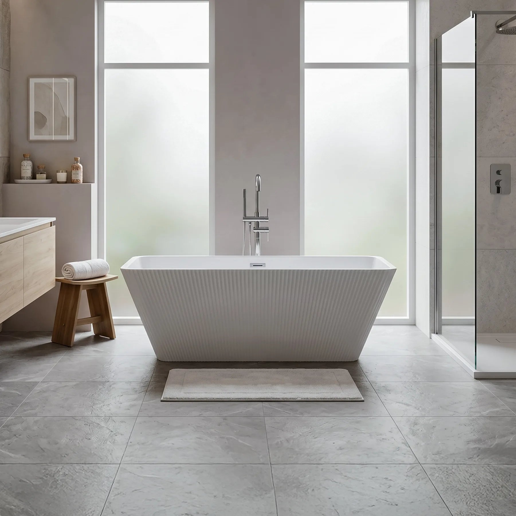 Modern bathroom with a freestanding bathtub in a well-lit room.