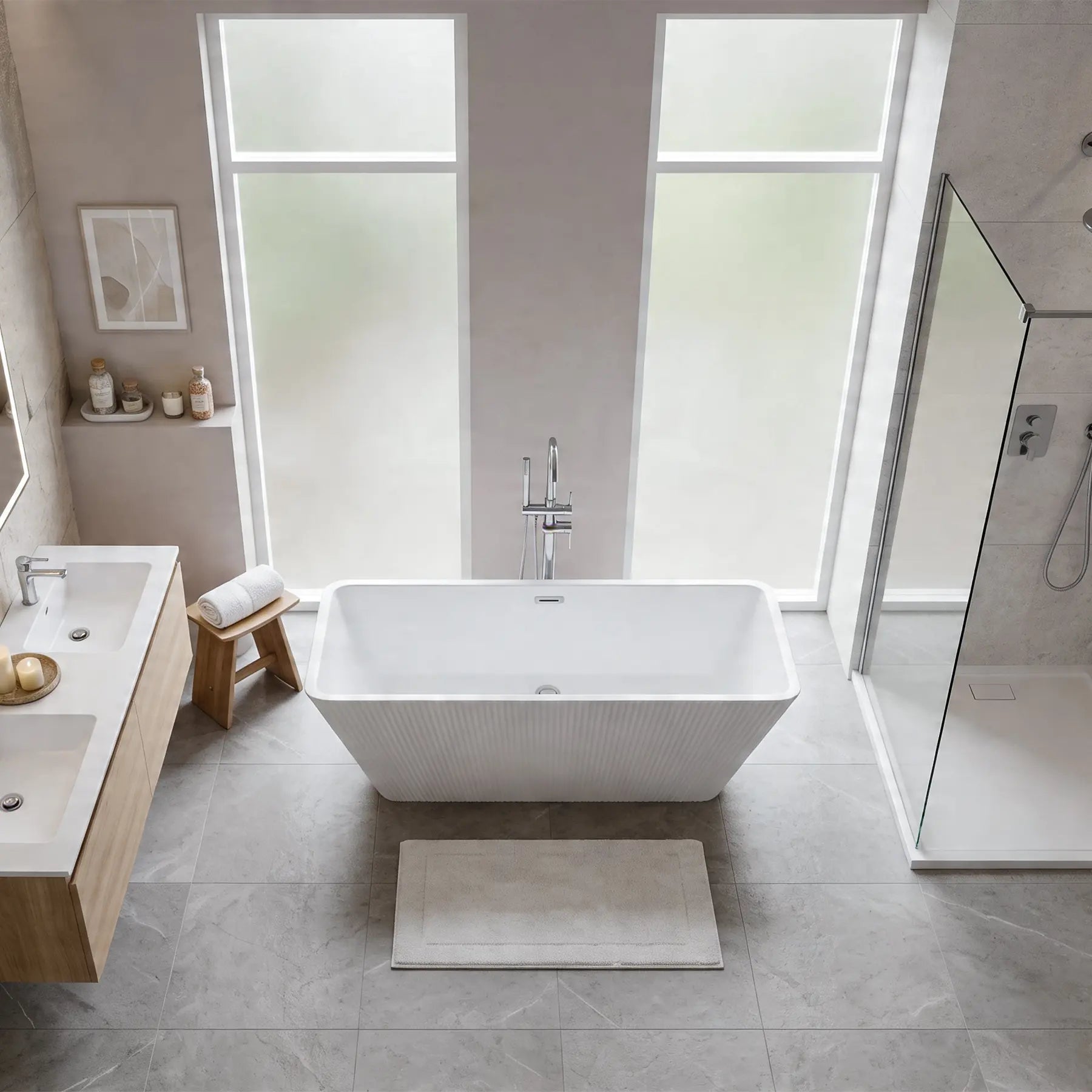 Modern bathroom with a freestanding bathtub, sink, and shower area.
