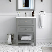 Gray vanity with white countertop in a bathroom setting