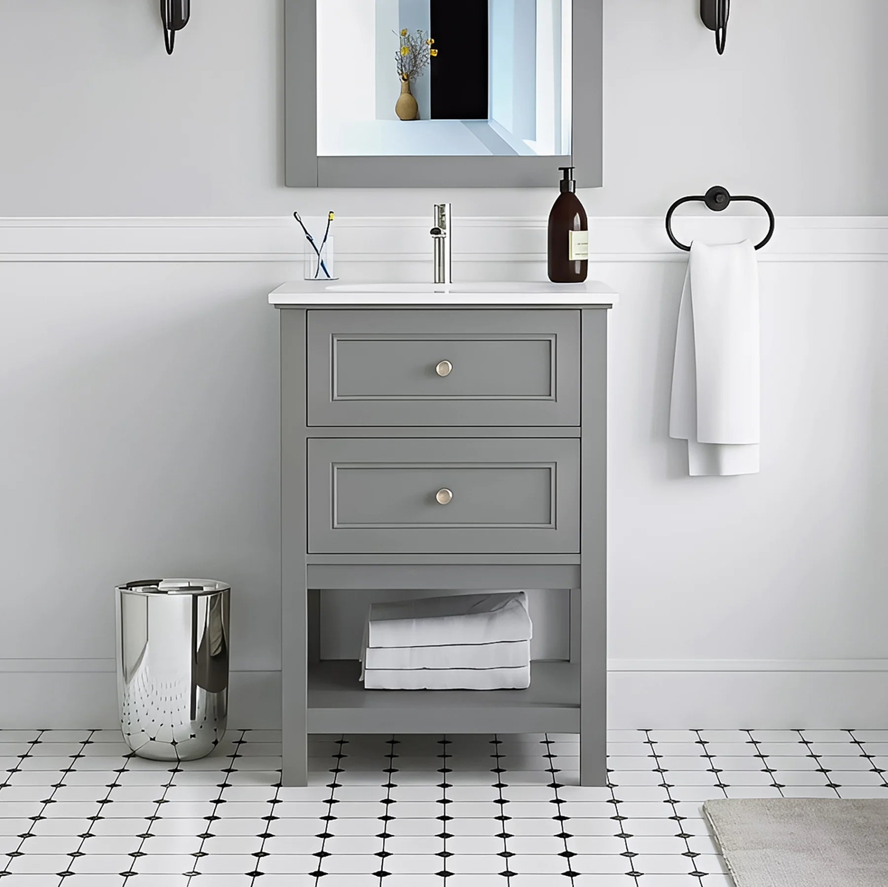Gray vanity with white countertop in a bathroom setting