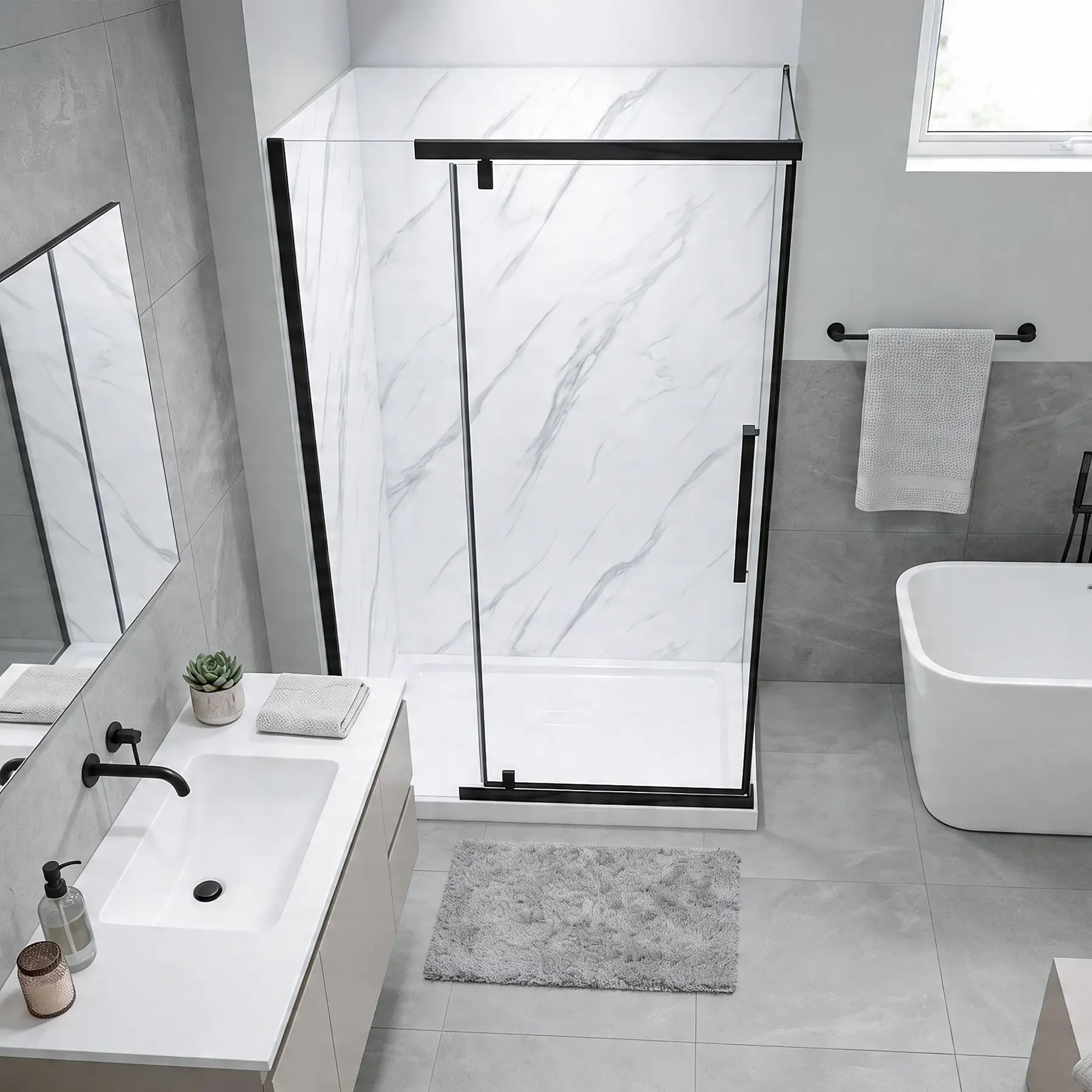 Modern bathroom with a shower enclosure, sink, and bathtub.