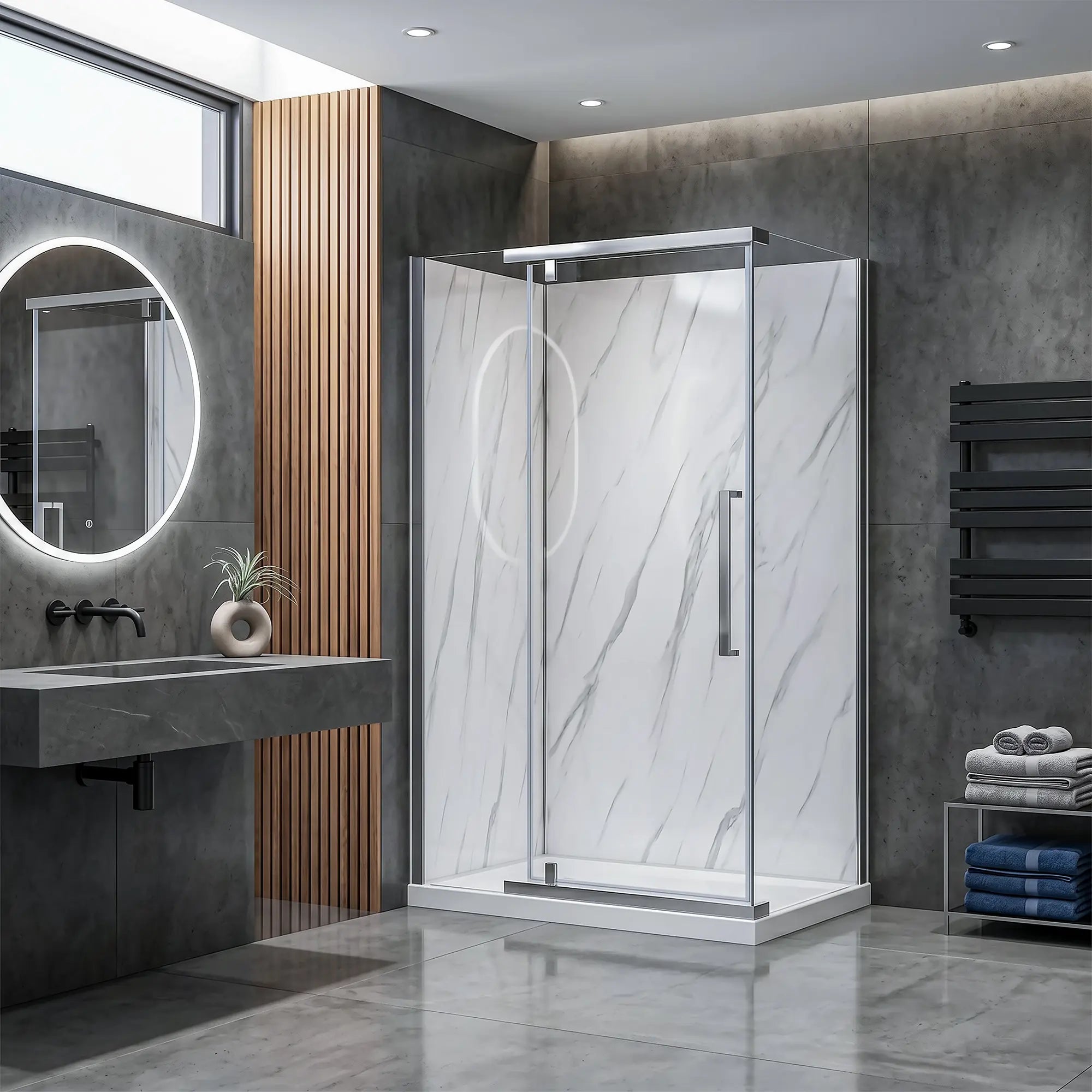 Modern bathroom with a shower enclosure, sink, and towels.