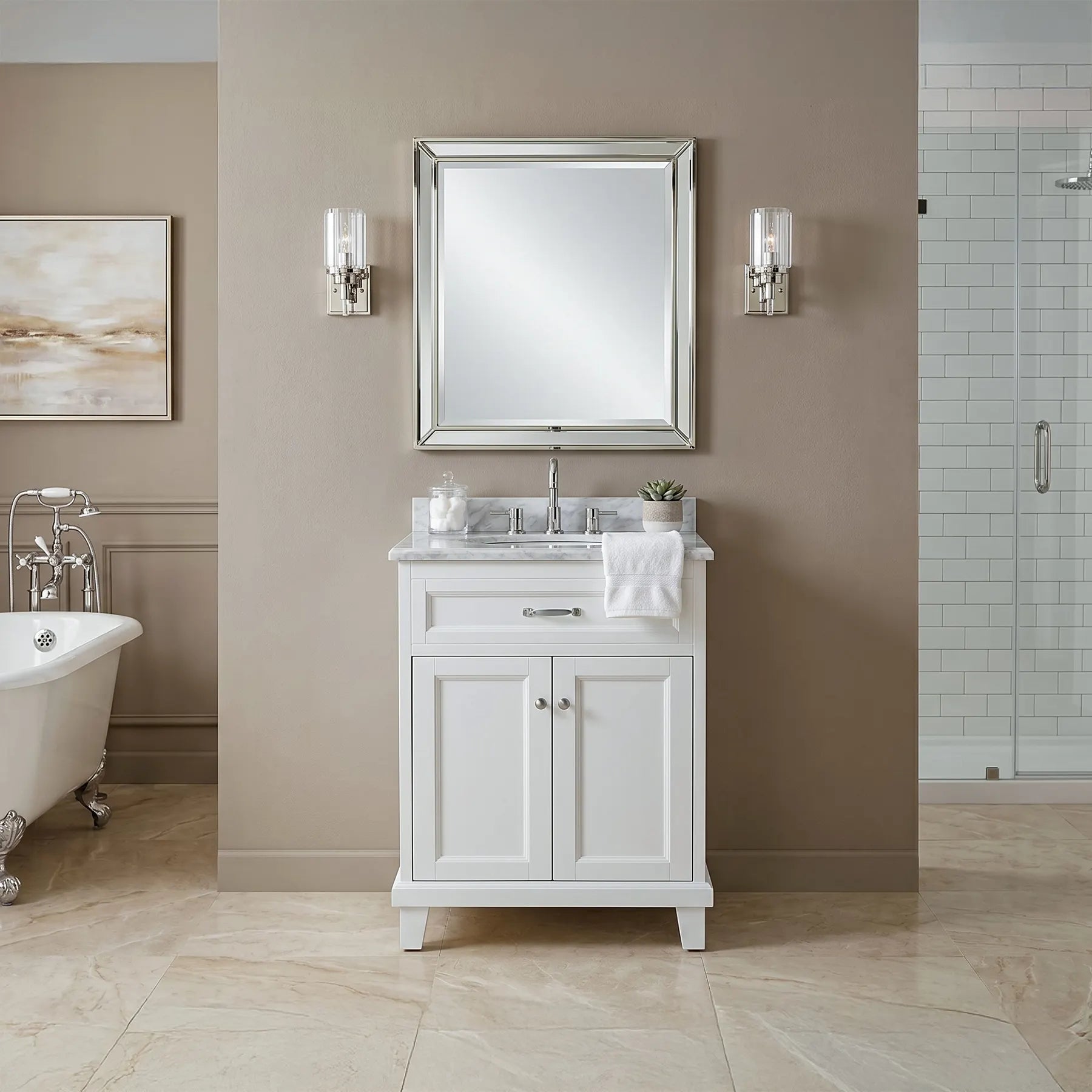 Bathroom with white vanity, mirror, and freestanding bathtub.