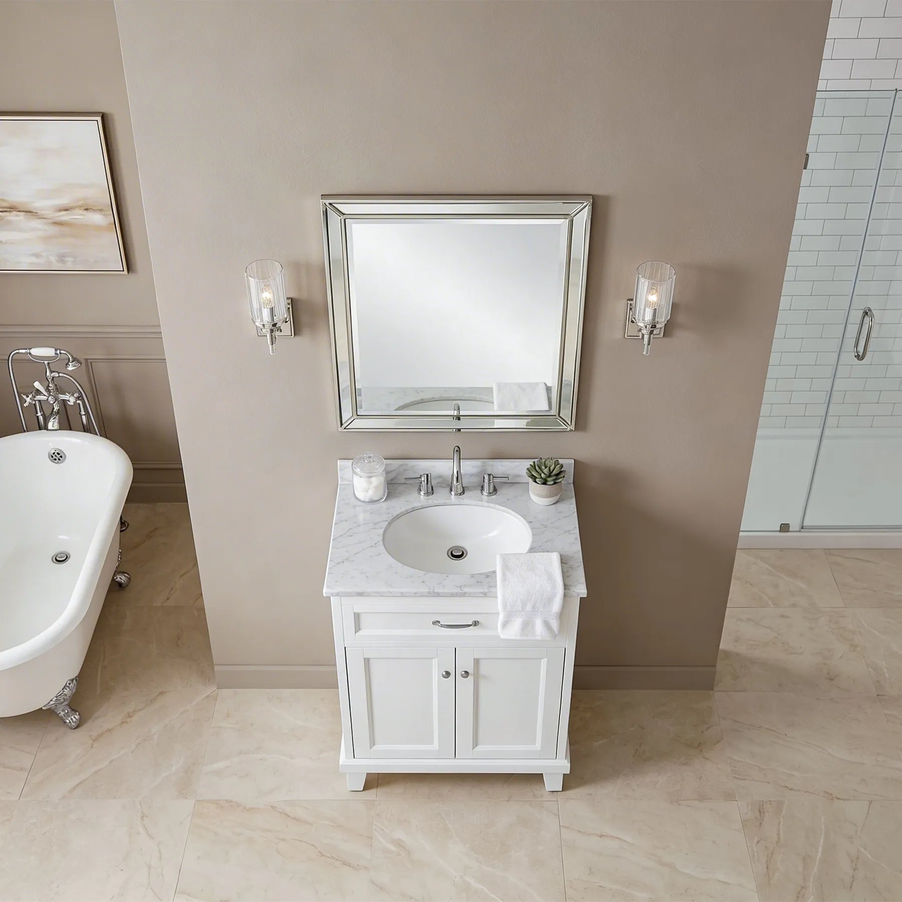 Bathroom with white vanity, sink, and mirror above a bathtub.