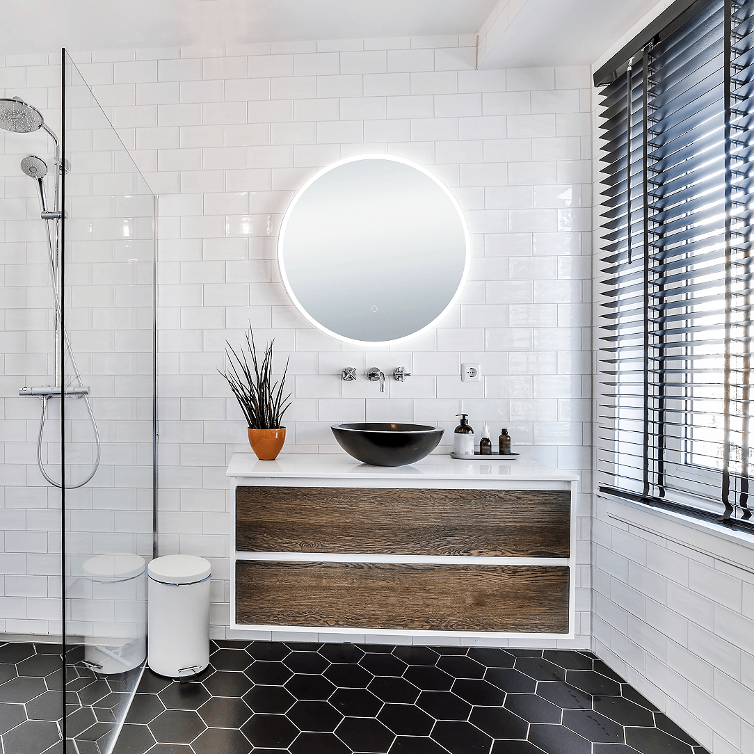 Onyx Frameless round LED mirror with touch sensor, defogger, and halo lighting effect - Dreamwerks