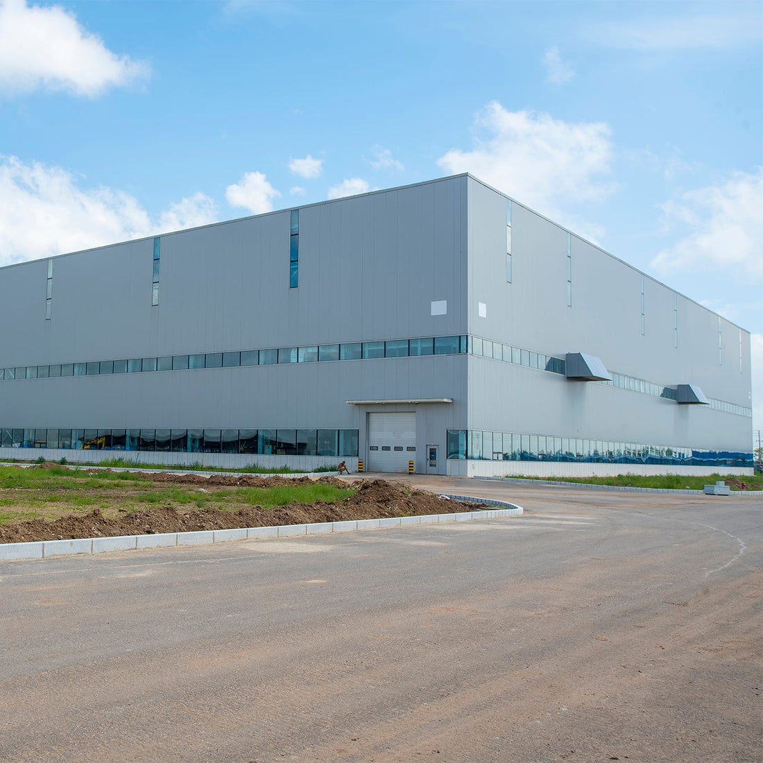 Large industrial building with a clear sky